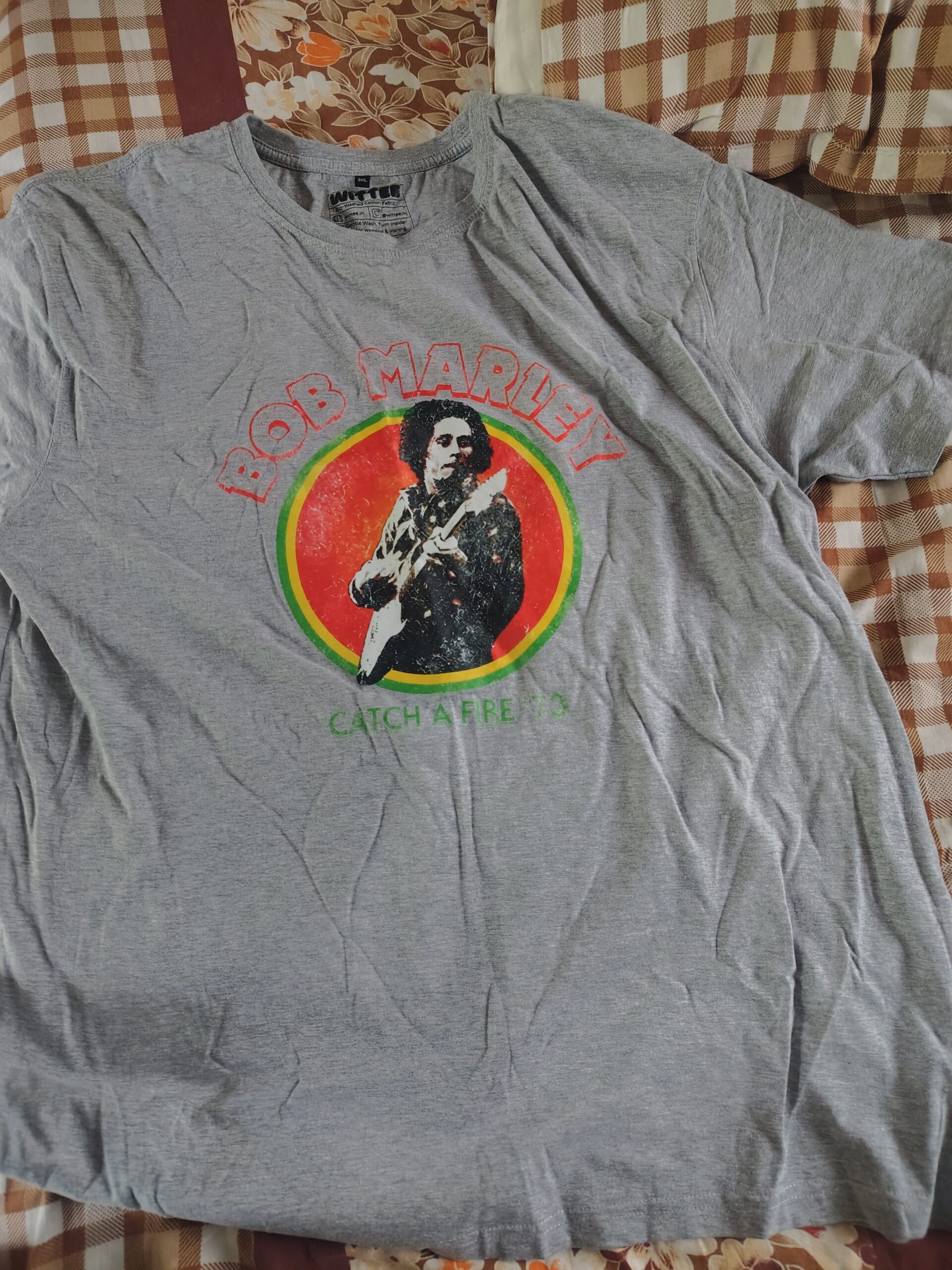 Click to view full screen bob marley t shirt catch a fire